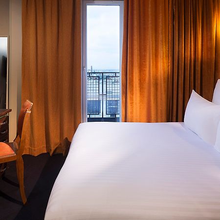 Hotel Le Chat Noir Parigi Esterno foto