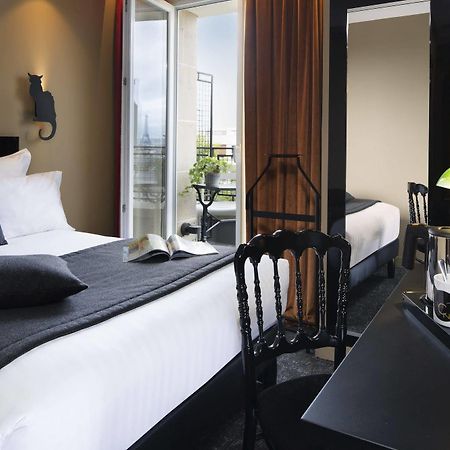 Hotel Le Chat Noir Parigi Esterno foto