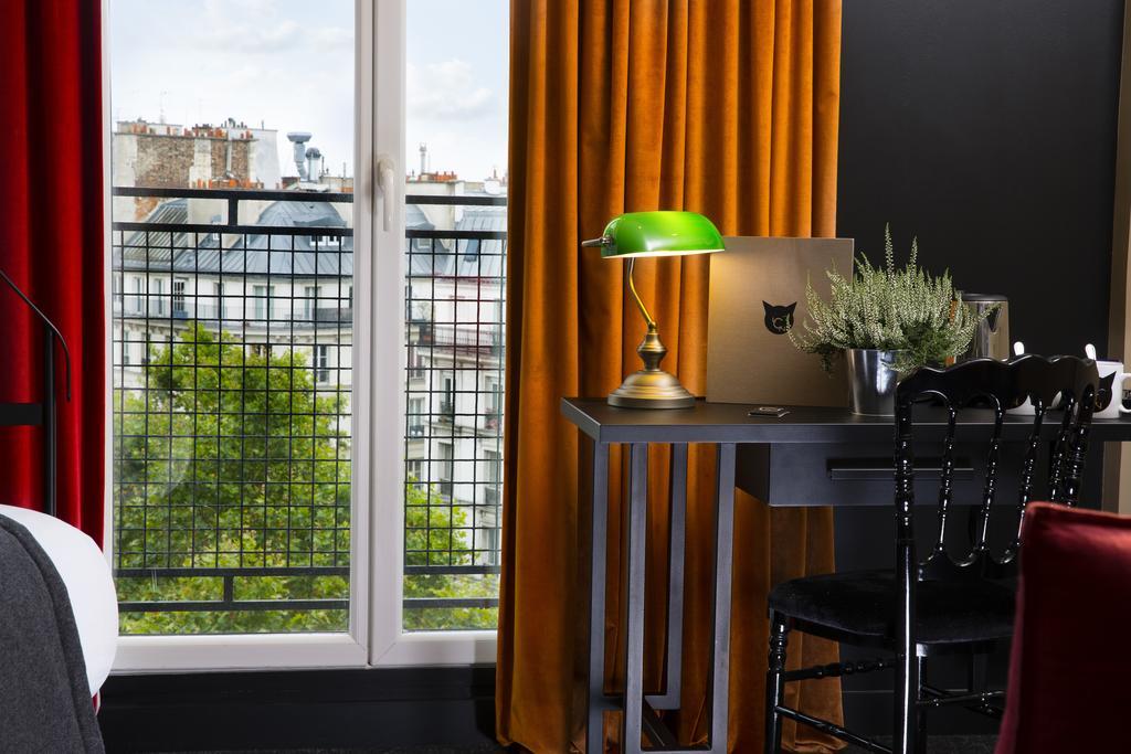 Hotel Le Chat Noir Parigi Esterno foto
